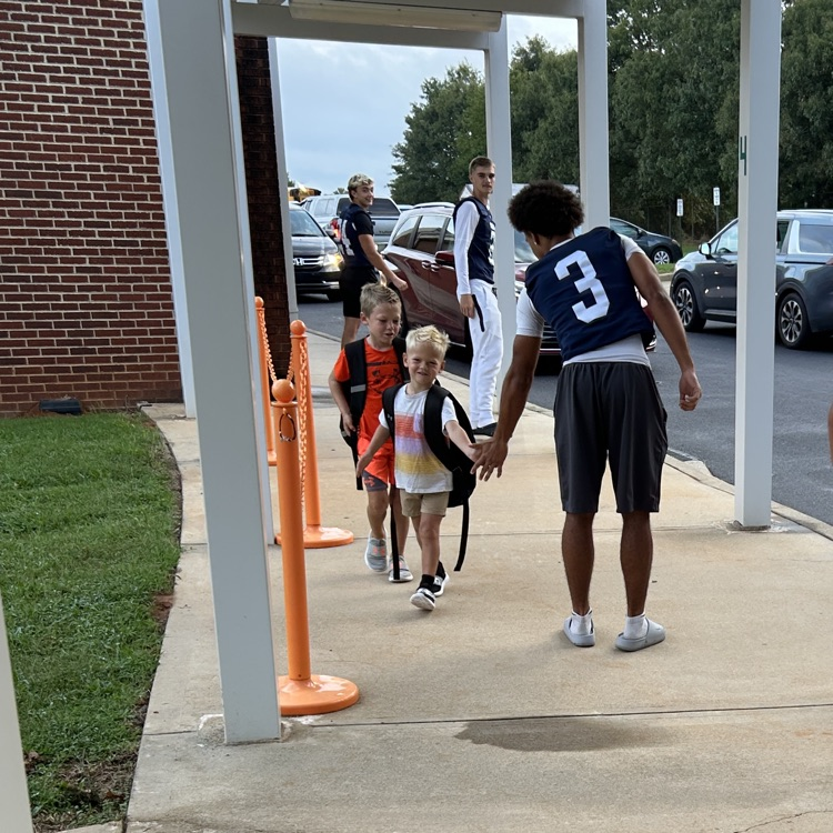 Thank you to the Powdersville Patriot football players who came and opened car doors for our students this morning!  Good luck tonight! We are cheering you on!