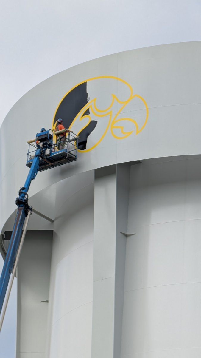BlairASanderson's tweet image. New water tower being painted at the University of Iowa