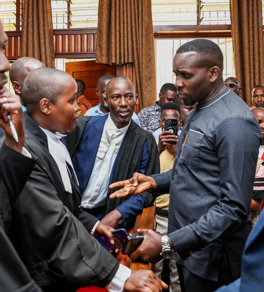 This picture says it all.

Hate her as much as u want, but she is an asset in NUP. If u think am lying, look that this picture.

Malende doesn't go to court because of the card, it's exactly what she does.
And I wish u luck in fighting it.