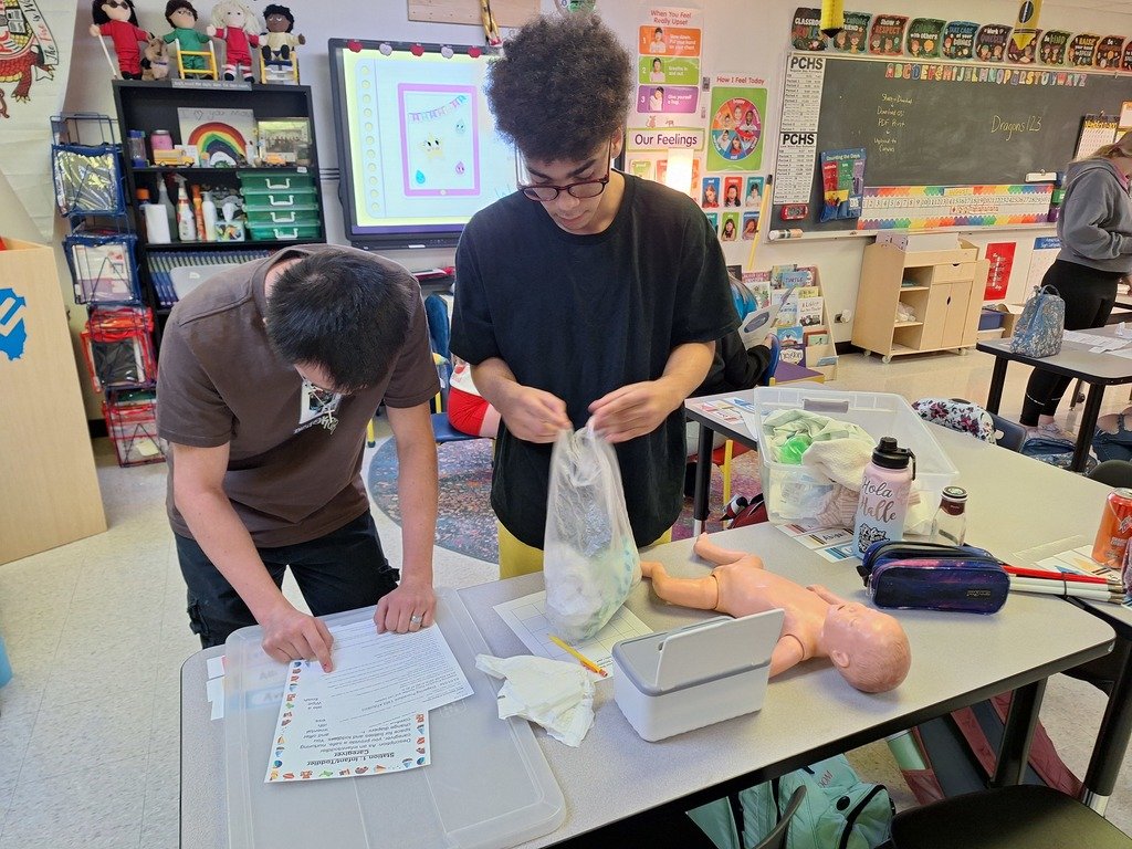 PCHSDragons's tweet image. Early Childhood Ed students particpated in simulations of various ECE roles- diaper changing, book reading, snack prep, arts, and behavioral guidance. #ECEmatters #GrowingTheFuture