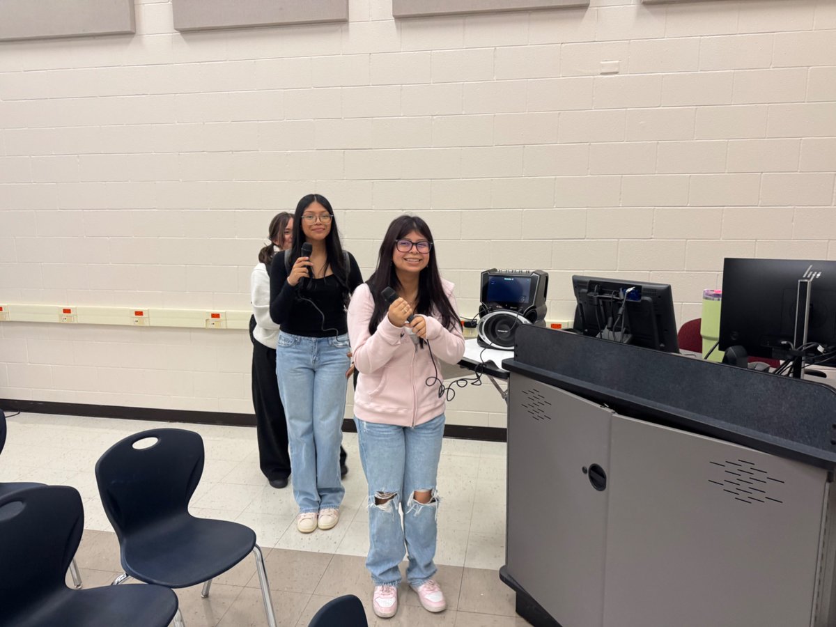 My gals performing Como La Flor by Selena - lunch fun with the principal.