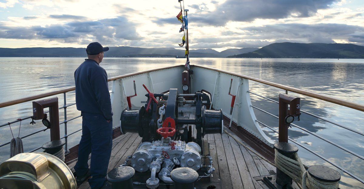 Perks of the job. One of Waverley's crew enjoys the view as Waverley prepares to come into Kilcreggan during a cruise on a beautiful late summers evening. <a href="/PS_Waverley/">Paddle Steamer Waverley</a> <a href="/NatHistShips/">National Historic Ships UK</a> <a href="/PSPS_UK/">PSPS</a>