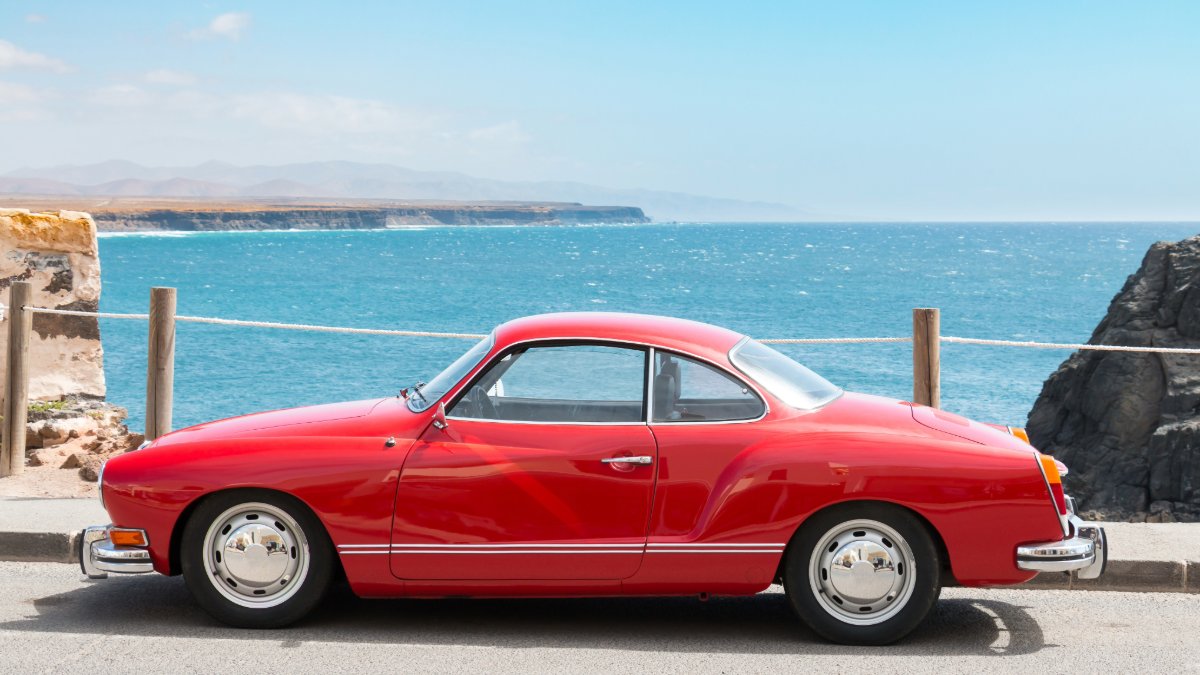 The Summer Sun's Secret Attack on Your Car's Paint! ☀️ Protect your investment from harmful UV rays. Learn how sun exposure leads to fading &amp; clear coat damage (especially on vibrant reds!).