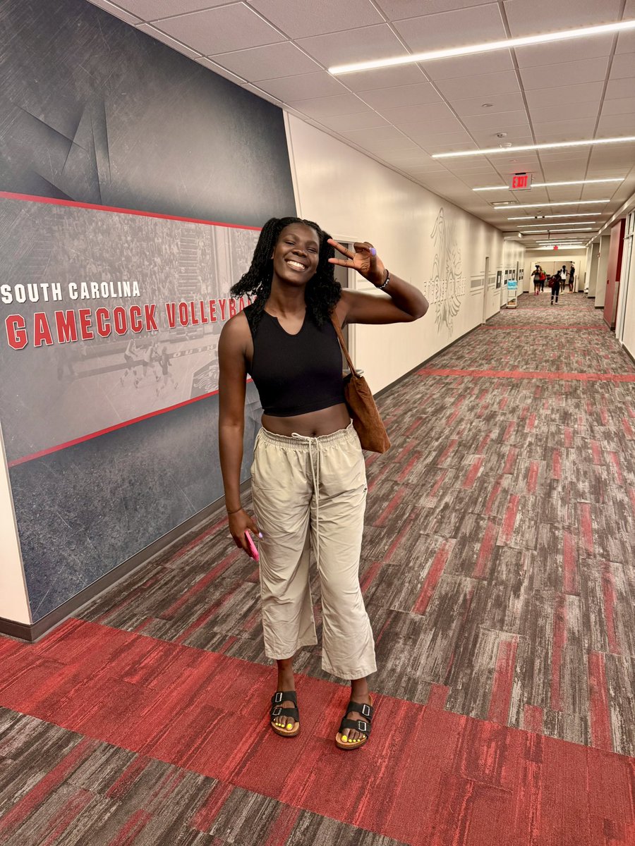Caught our girl <a href="/MadinaOkot84132/">God’sfavoritegirl🤗</a> after a workout on her way to a study session. Day 2 Fall semester as a <a href="/GamecockWBB/">South Carolina Women's Basketball</a> and you can see how her smile lights us up! 
Always working. Always smiling!