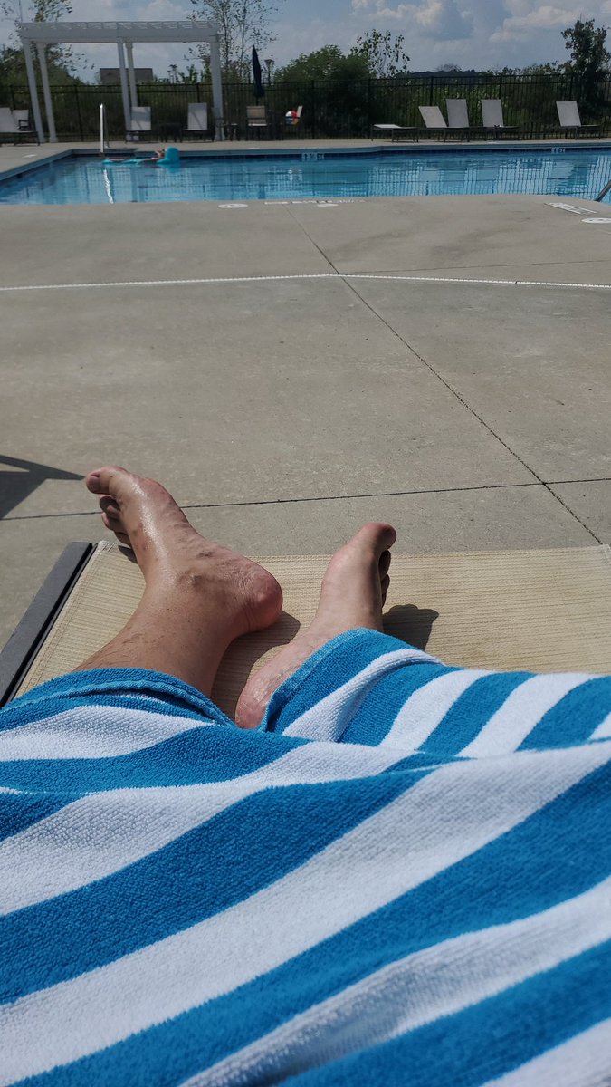 THIS is #retirement ! School back in session. Real feel like 100 degrees. TWO of us in the nbrhood pool!