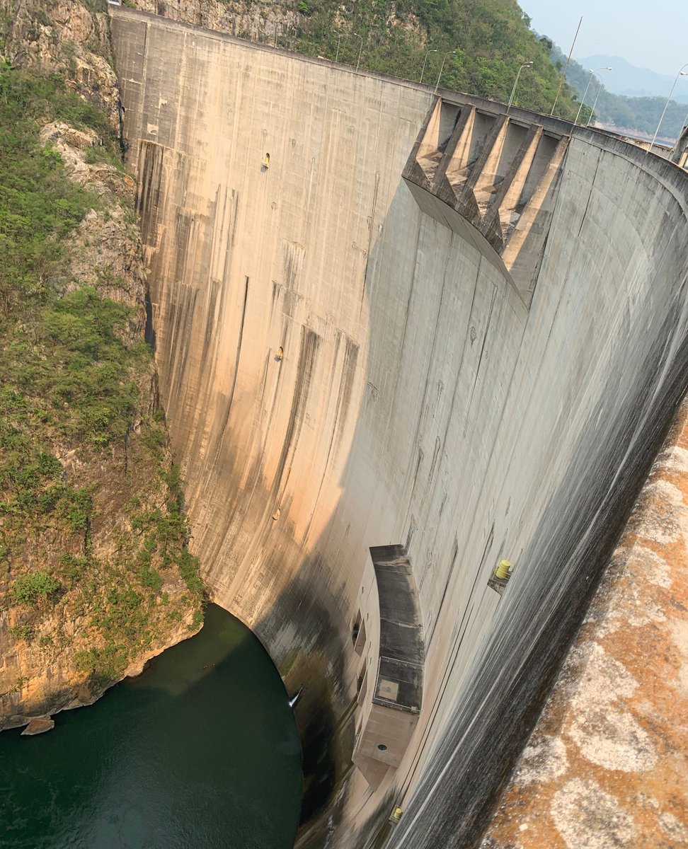 RAHBooks's tweet photo. In 1998, a hurricane called Mitch swelled Honduras’s rivers. Throughout that tempest’s landfall, 1.3 trillion pounds of stormwater, a weight far greater than the combined heft of the entire human race, pressed up against the backside of this dam. Yet incredibly, it held strong. https://t.co/tfXTKTBNlL