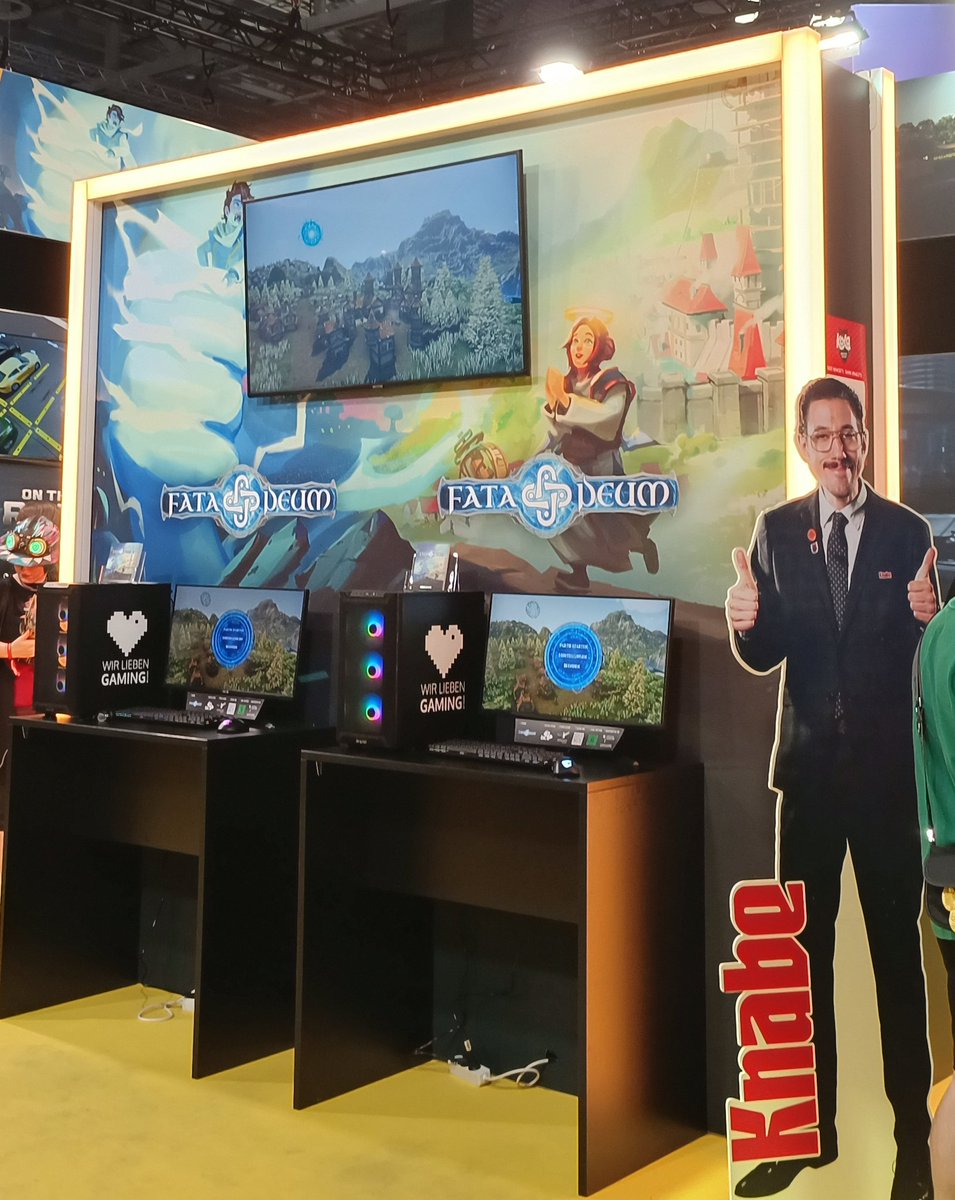 Very nice booth 🥰 with our music and sound at GC, hall 9: Fata Deum from <a href="/42BitsEntertain/">God Game Fata Deum</a> .Knabe kola approves?