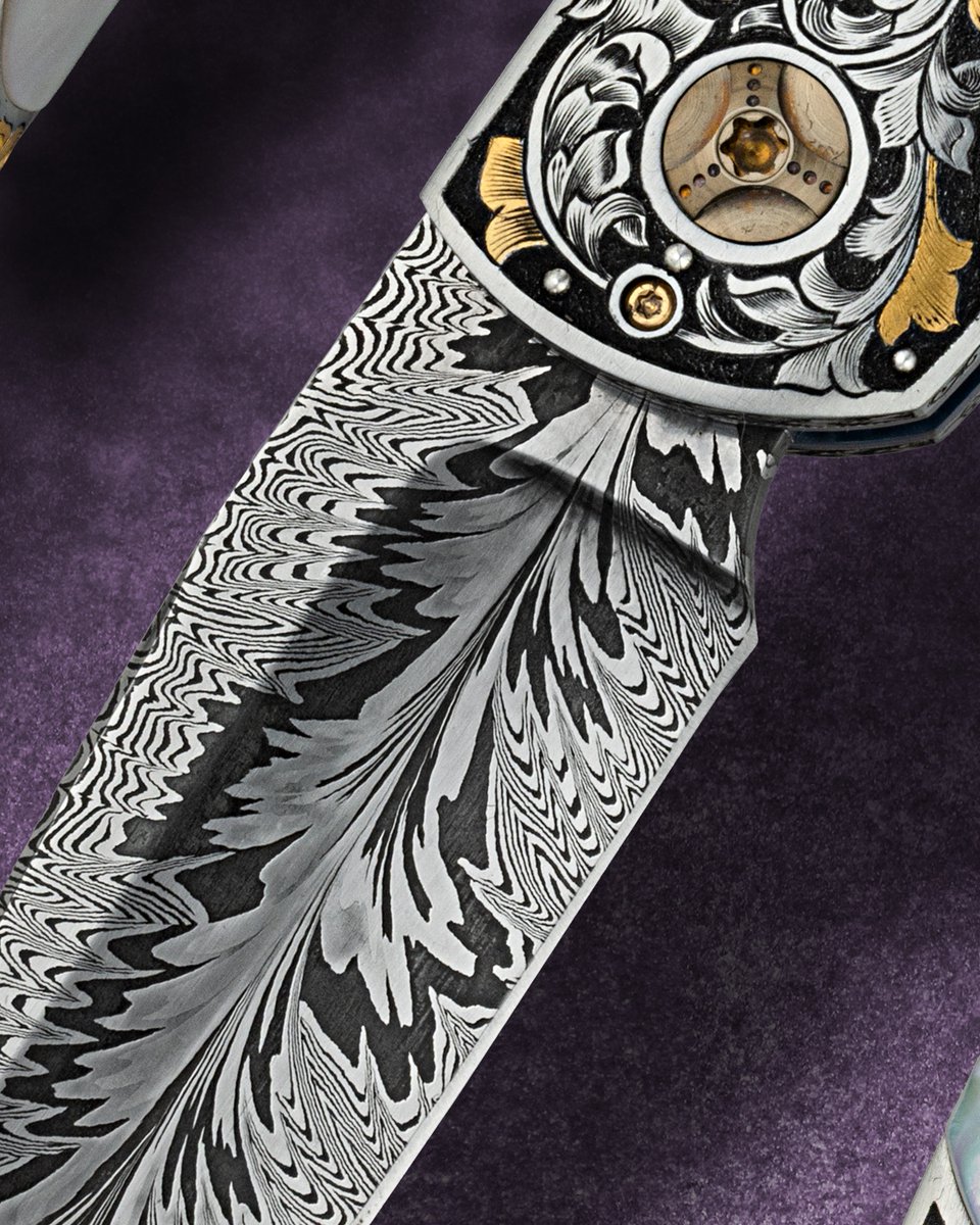 There's a lot to love here!  Andy Isaacks knows how to please.

Genesis ll Auto, Tulip Feather blade, MOP scales, anodized titanium liners, 416SS bolsters engraved by Dale Bass

#jfrasierphotography