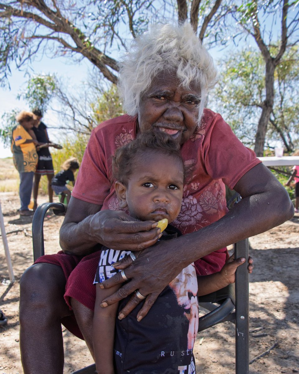 KJMartu's tweet photo. At Jila-Jila, #MartuFamilies from the #KJWomensAndFamiliesProgram in #Punmu spent the day #OnCountry. The kids explored Country then played Martu Snakes + Ladders, created by the #KJLanguage Team, to learn animals from #MartuCountry in #MartuWangka. #KeepingCultureStrong https://t.co/OSbRuYHl1f