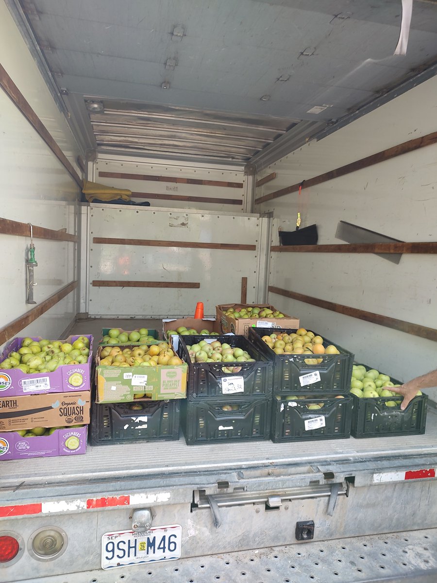 Big thanks to Evergy's Green Team, who came out to the orchard today to help us prune our apple and pear trees with their bucket trucks!   They also helped us pick 1000 pounds of produce for the pantry!