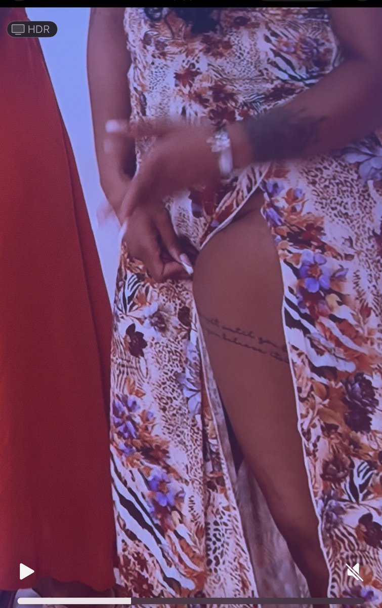Precious1love's tweet photo. Idk if this one was showing her tattoo or 🐱like girl let that dress hang #poptheballoon https://t.co/qwb117H4PS