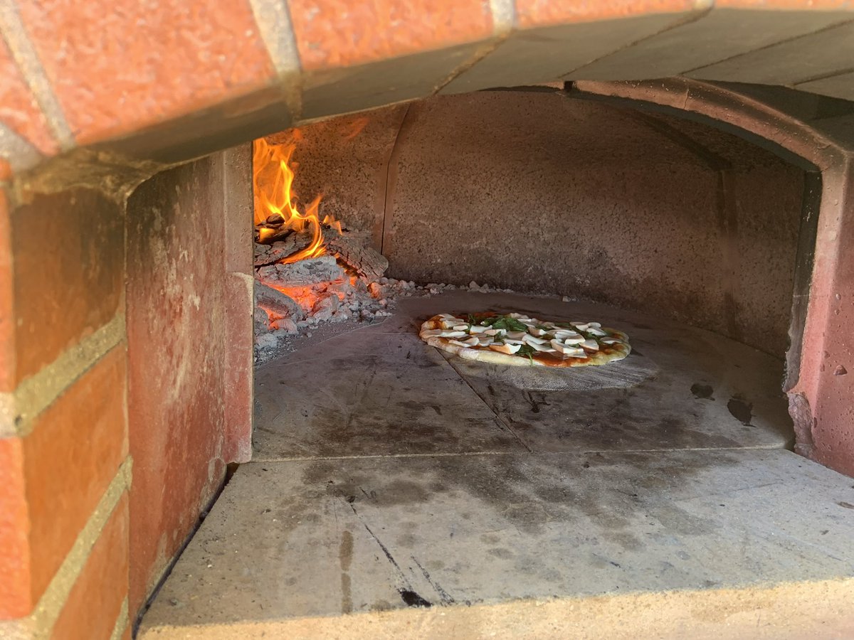 First pizza made in 5 years. It was so, so. I miss my wood burning pizza oven in Cali. But the wine was phenomenal!