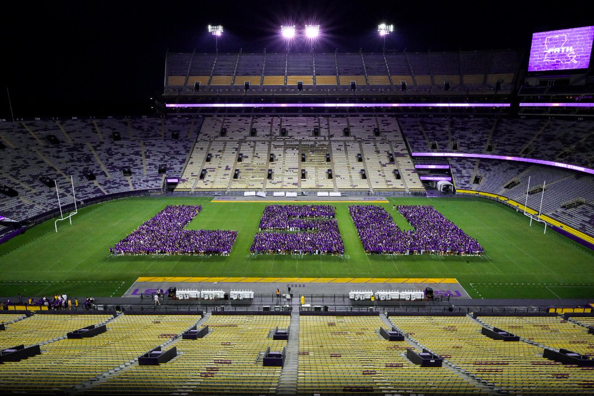 LSU's tweet photo. Welcome home, #LSU29 💜💛 https://t.co/m63443kr9h