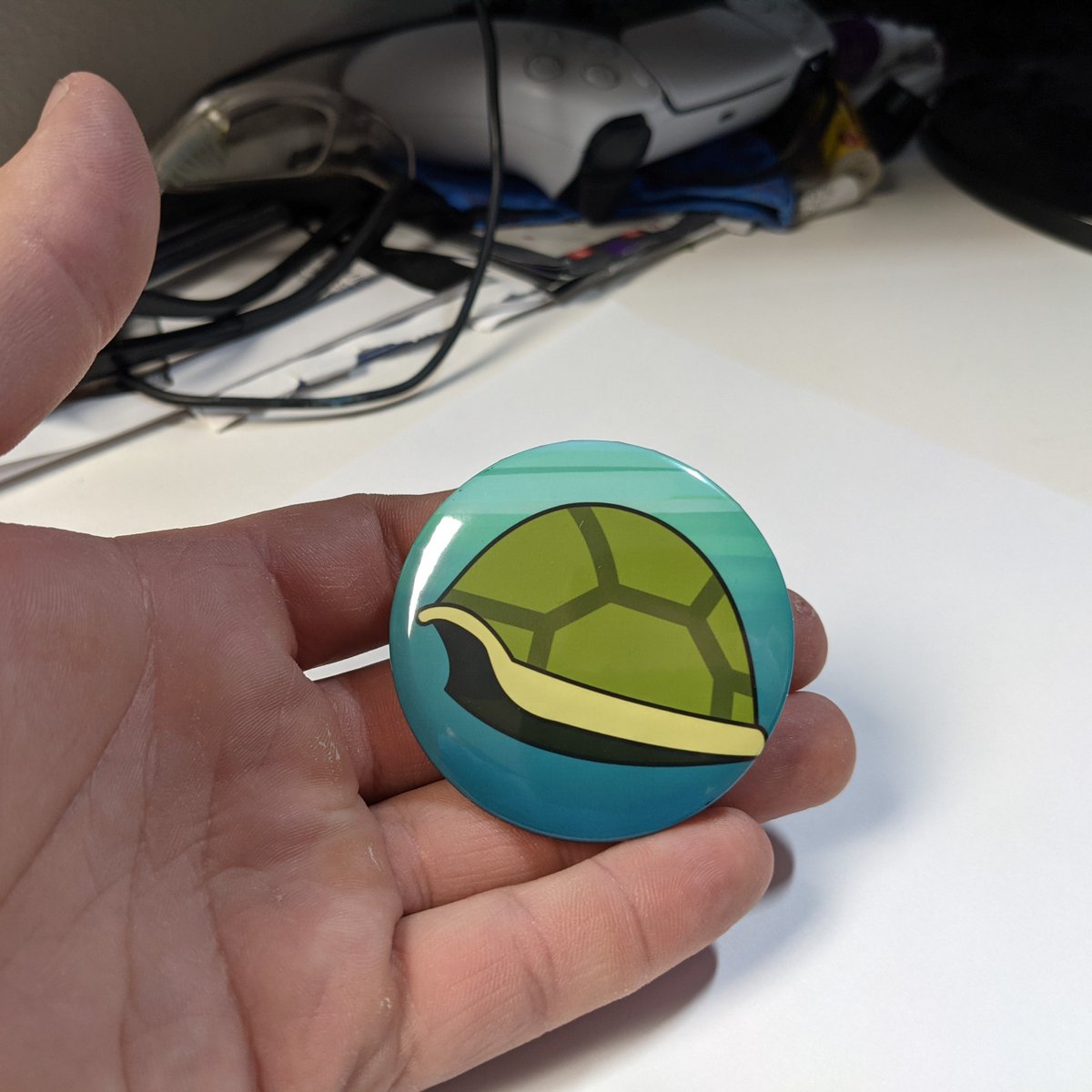 I'm thinking of selling custom 2.5 inch pins. I'd be offering 50 pins for 20$+shipping so that I can get in a groove, and make a little profit on each pin. Is there anyone out there that would be interested in that?