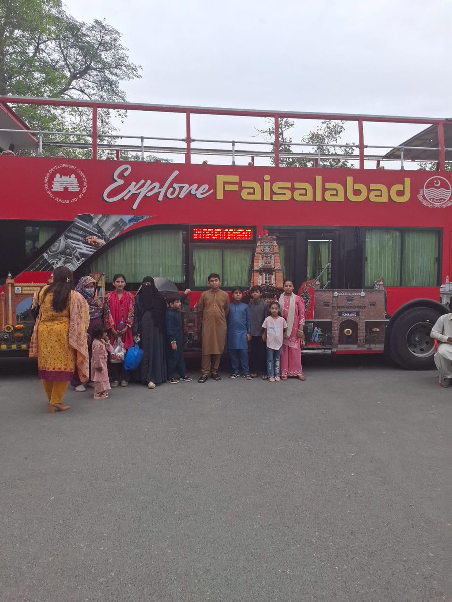 STdcp3190's tweet photo. Family poses for a photo with Double Decker Bus to commemorate  their tour before departure #TDCP #SFBS @TDCPOfficial https://t.co/K2Cut6VkQW