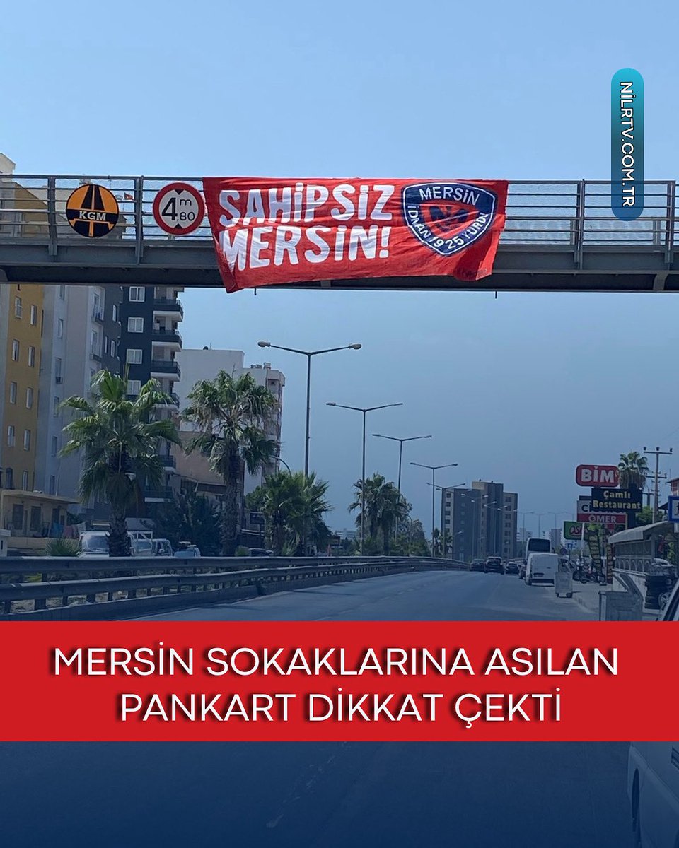 Nilradyotv's tweet photo. Mersin sokaklarına asılan pankart gündem oldu. 
Mersin İdman Yurdu belirsizliği sürerken Mersin’deki bir üst geçide “Sahipsiz Mersin” pankartı açıldı..

#mersin #sahipsiz https://t.co/JgVeR8bHYg