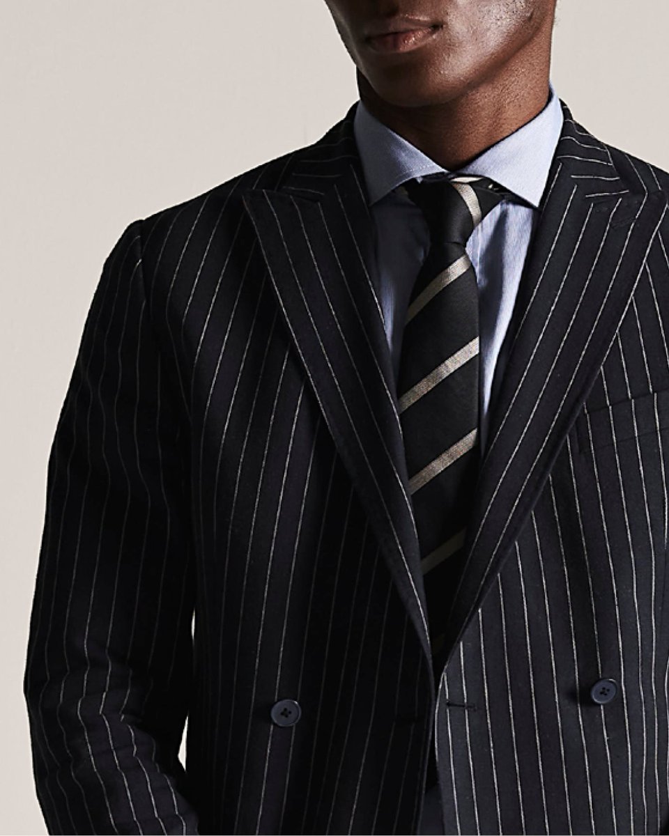 Pinstripe tailoring, redefined.
Blazer &amp; shorts. Shirt &amp; tie. Sandals &amp; cap.

Classic meets contemporary - timeless meets today.