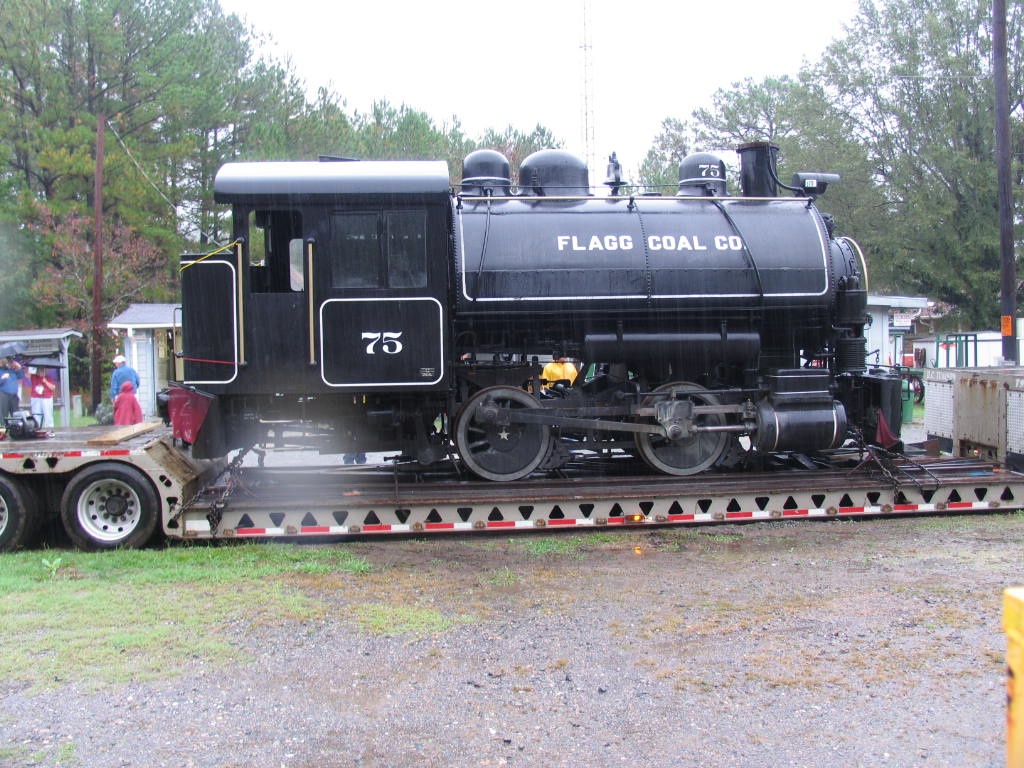 Triangle_Train's tweet photo. #Throwback to a special rainy day in October 2007 when locomotive #75 was moved to Bonsal! #ThrowbackThursday #TriangleTrain #Locomotive #History #NCTrains #Trains #NorthCarolina #BonsalNC #TrainRide #RailEnthusiast #Railfan #NorthCarolinaRailwayMuseum #NHVR #NCRM https://t.co/oe9TVHCQ3U