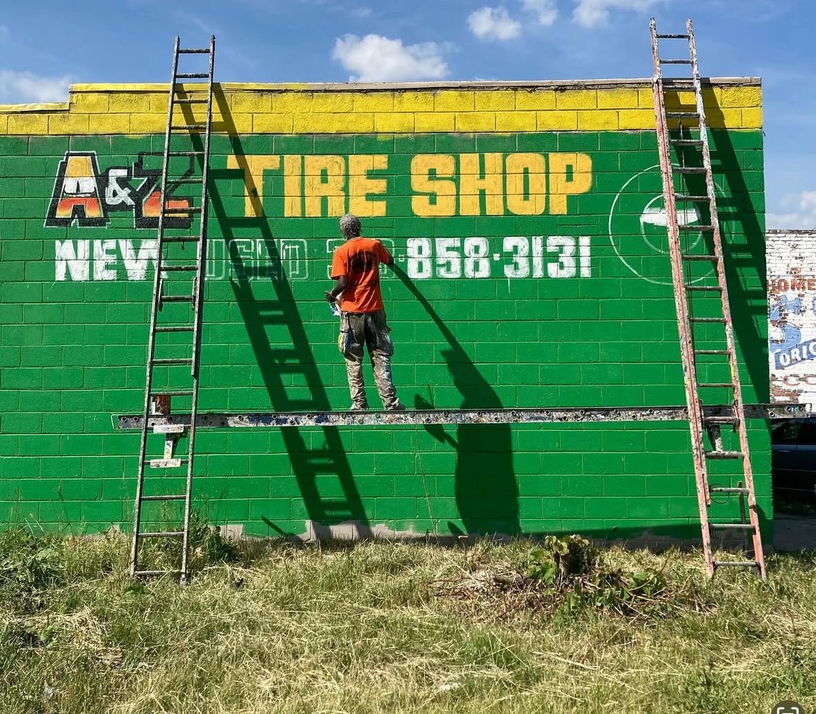 I couldn’t find much on Ron in my research, no articles, blog posts, or even his last name, except for a few posts on Instagram by fellow Detroit sign painter Jordan Zielke who was mentored by Ron. Here’s some photos of Ron courtesy of Jordan
