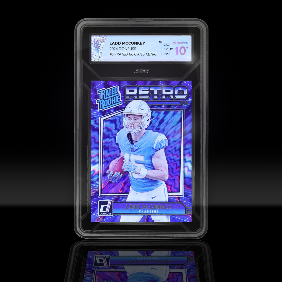 GradingEdge's tweet photo. Had our first flawless card come through this week. 10.5 ULTRAMINT. Zero imperfections and 52/48 centering! #gradedcards #cardgrading #edgegrading #ultramint #sportscards #footballcards #laddmcconkey #larams https://t.co/yQJplVpSFo