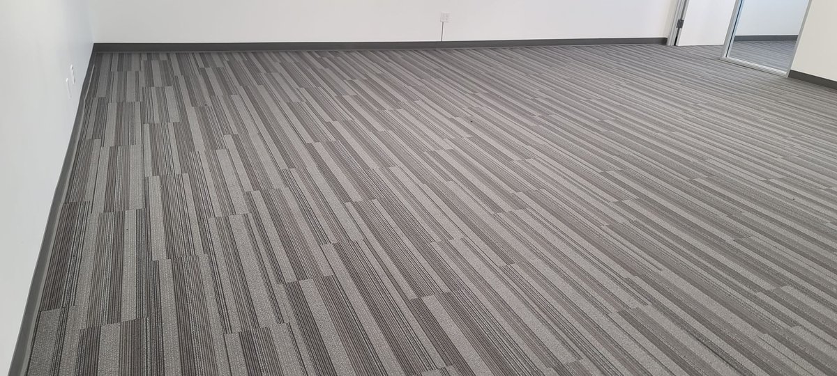 StaticWorx's tweet photo. For an electronics test lab, high vapor levels in the concrete slab made a glue-down flooring system impractical. When a slab is damp, adhesives won’t bond. Glue can turn into sludge under the tile.

Solution? A free-floating ESD flooring system using ShadowFX SD carpet planks. https://t.co/zzrllLilQ4