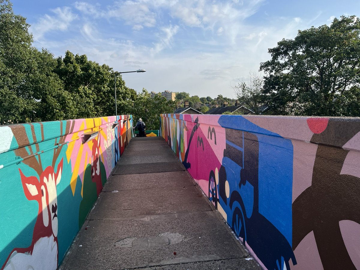 richmondsociety's tweet photo. There’s a new mural on the pedestrian footbridge between St Mary’s Grove and Sheendale Road in North Richmond. It aims to commemorate the heritage of the area - from agricultural to industrial. https://t.co/4dkFjusG0L