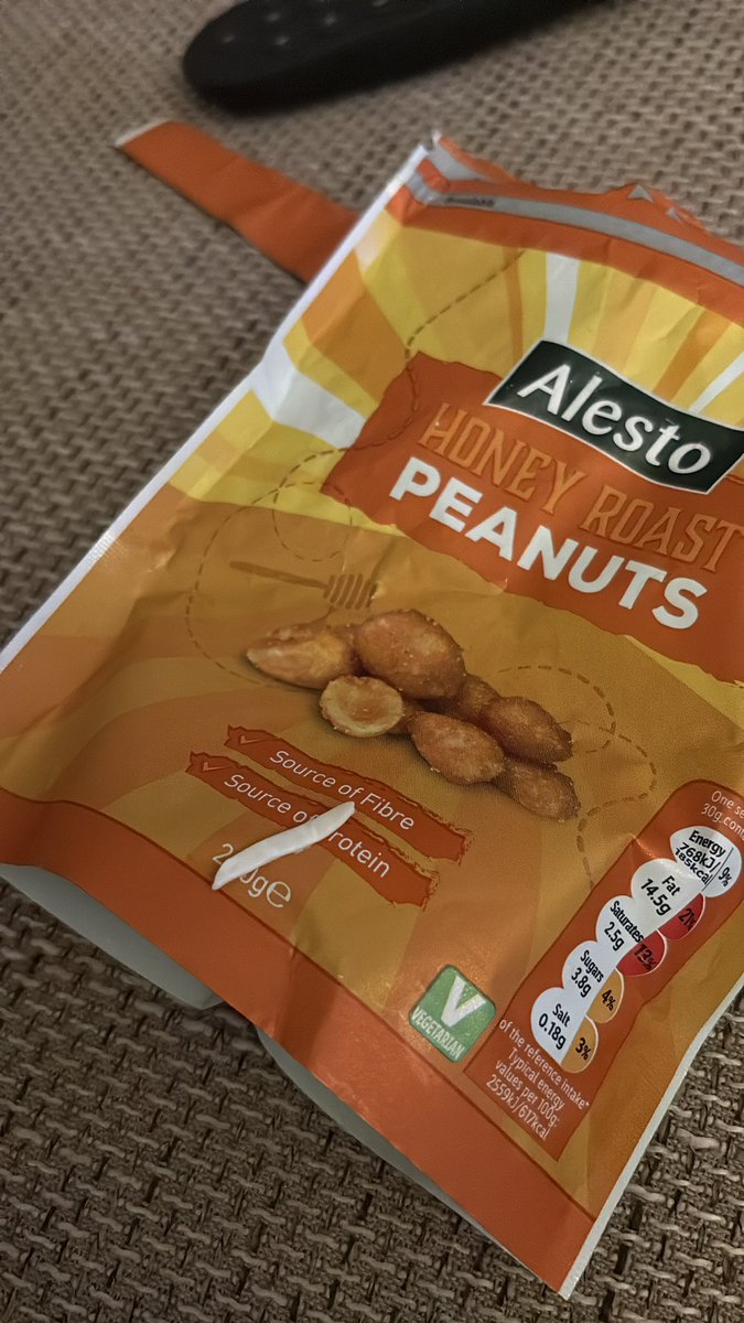 the2019badger's tweet photo. @LidlGB I have just started to eat these and poured some in my mouth and then nearly choked on this piece of plastic from inside the bag https://t.co/I0soFSe0nf
