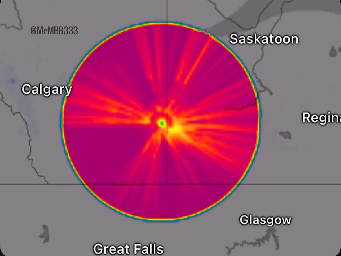MrMBB333's tweet photo. Huge radar anomaly — happening again.
For 51 minutes straight, a 320+ mile wide sky donut lit up over 2 Canadian provinces &amp; Montana. 🤨 

No storms. No humidity. Too big, too perfect to dismiss.

What are we really looking at here? 👀

#RadarAnomaly #MysteriousSky #MrMBB333 https://t.co/AX9MQGgUH6