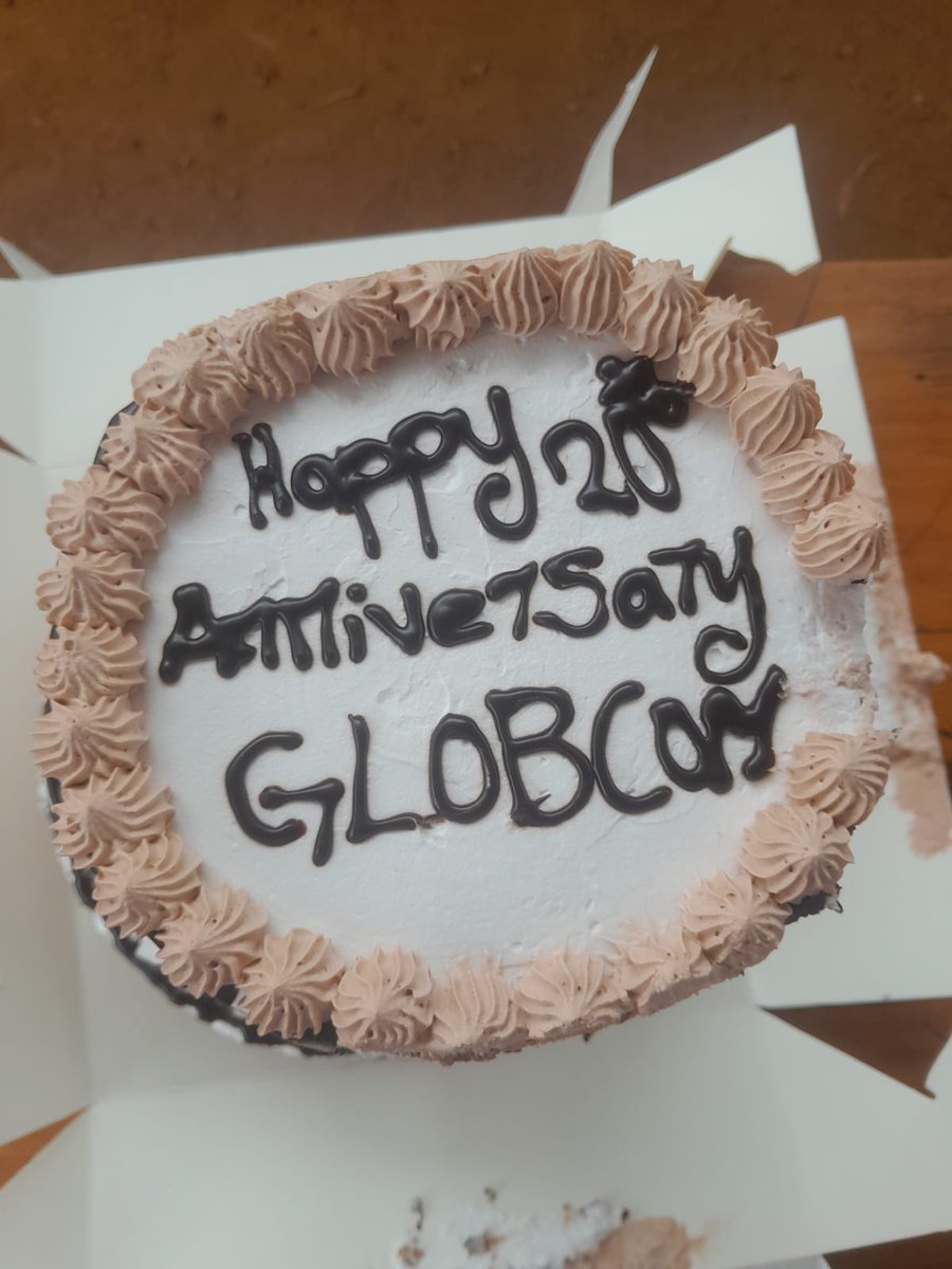 a cake to mark the celebration, <a href="/TheGlobcom/">GLOBCOM</a> at 20!