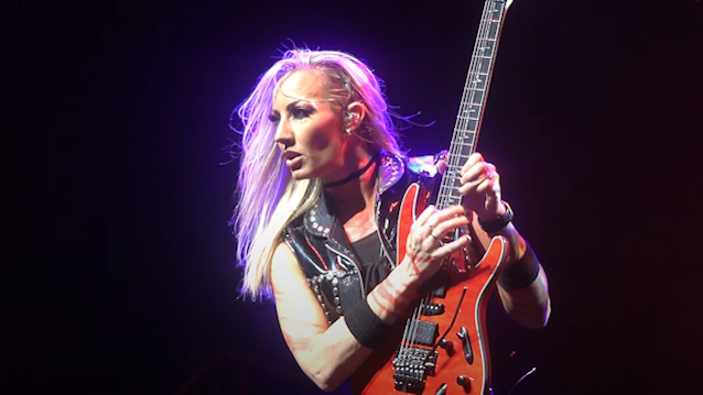 NITA STRAUSS Has 'About Half An Album's Worth Of Material Demoed Out' For Upcoming Third Solo LP blabbermouth.net/news/nita-stra…