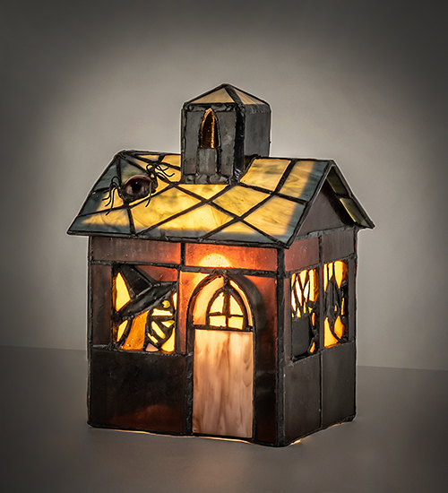MeydaLighting's tweet photo. Gearing up for spooky season? 👻 Don’t miss our Haunted House Accent Lamp - handcrafted with Tiffany-style glass and creepy-cute charm, it's the perfect way to light up your Halloween decor! 🕸️🧙‍♀️🕷️

Item Number: 69862
https://t.co/YRwx7ZafJd | 1.800.222.4009 ☎ https://t.co/WXMg9QbRr9
