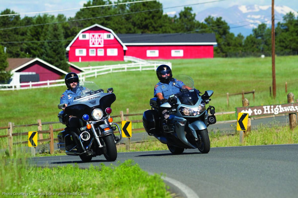 CSP_News's tweet photo. Trooper Valdez and Gallegos patrolling on their motor units in the early 2010's. That is a beautiful office with a view while on the Highways of Colorado. #90YearsStrong #DecadesOfDedication https://t.co/NxiR01v1ze