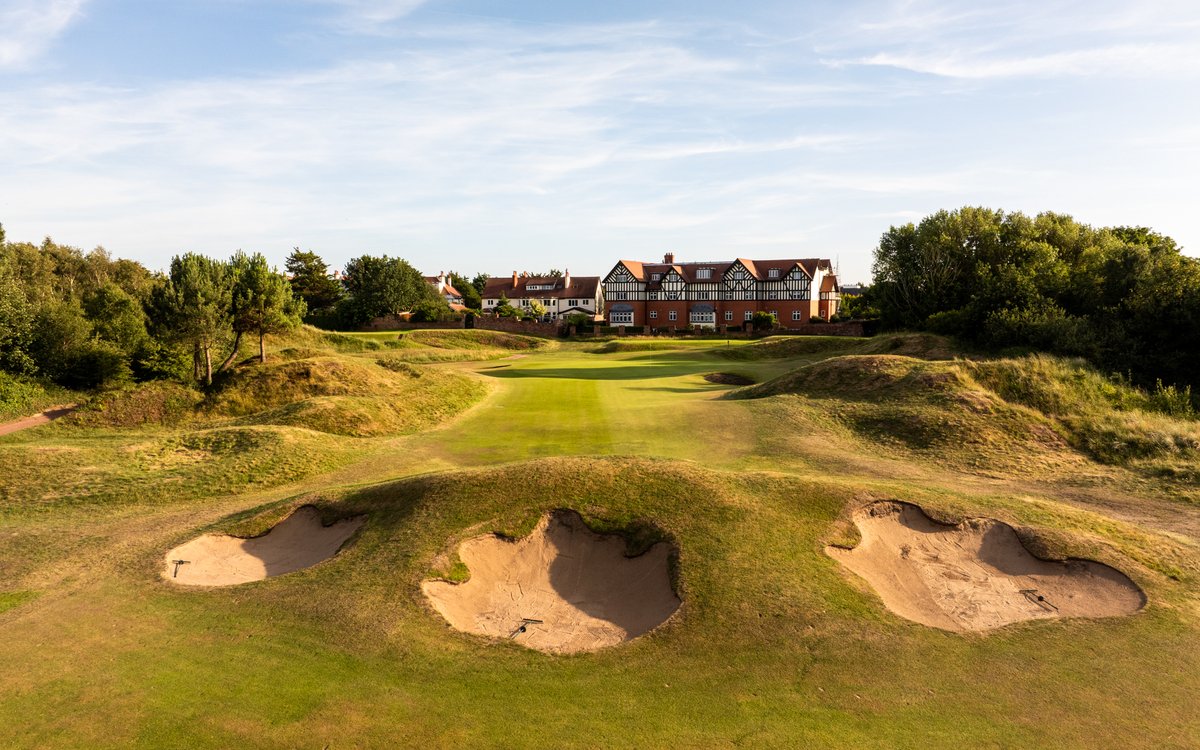 The view of the 14th green from the fairway is one usually reserved for birds and drones — the approach plays blind over a trio of bunkers called 'The Widows.'

Adding to the pressure? A handful of members watching from the clubhouse patio, tucked just left of the fairway.