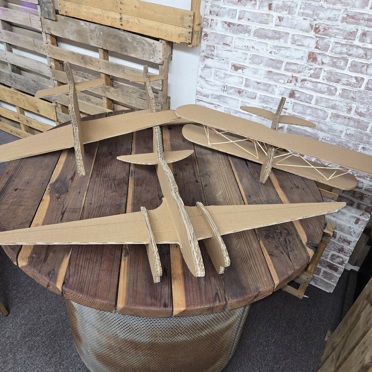 CaptGraybeard13's tweet photo. Okay I got the last plane made for the window display. I have two P-51s at different scales, a Hats classic biplane and a DH-88. Here are the paint schemes we will use for them. In the comments #ravencraft4113 #roswellairraces #p51D #DH88 #hatzbiplane #ImagineEscapeEnjoy https://t.co/T2lISQDXjJ