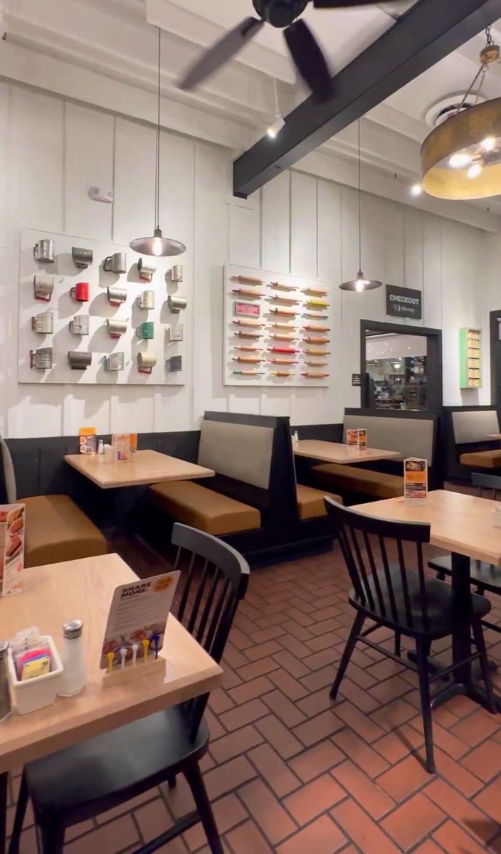 There is something strikingly uncanny about the new Cracker Barrel. The old one was lovingly adorned with keepsakes and cherished memories like your dad's old bedroom at grandma's house. The new one  showcases them like a science museum, like relics of a conquered culture.