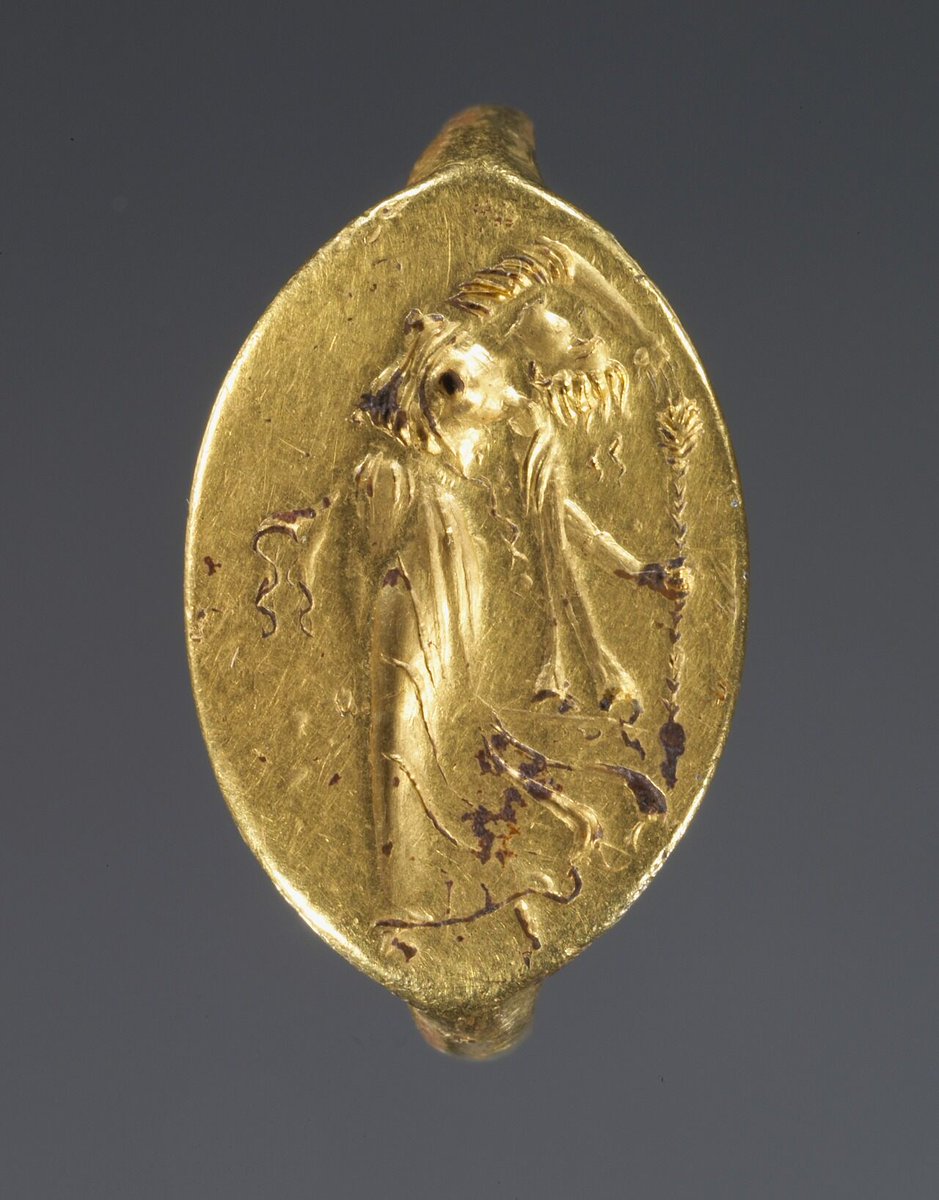 Greek Ring with dancing maenad, 400-300 BC, Getty Museum.