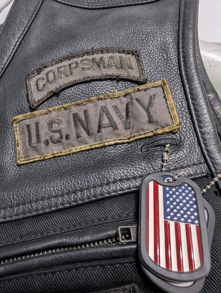 AVGDesigns's tweet photo. Stitched on patches, and added a buttonhole for this former corpsman's dogtags. He'd previously worn them through a small hole he'd punched in his old vest. 

First time using the embroidery machine for a buttonhole! The HCH Plus made quick and easy work of it, hooped on a Durkee EZFrame.