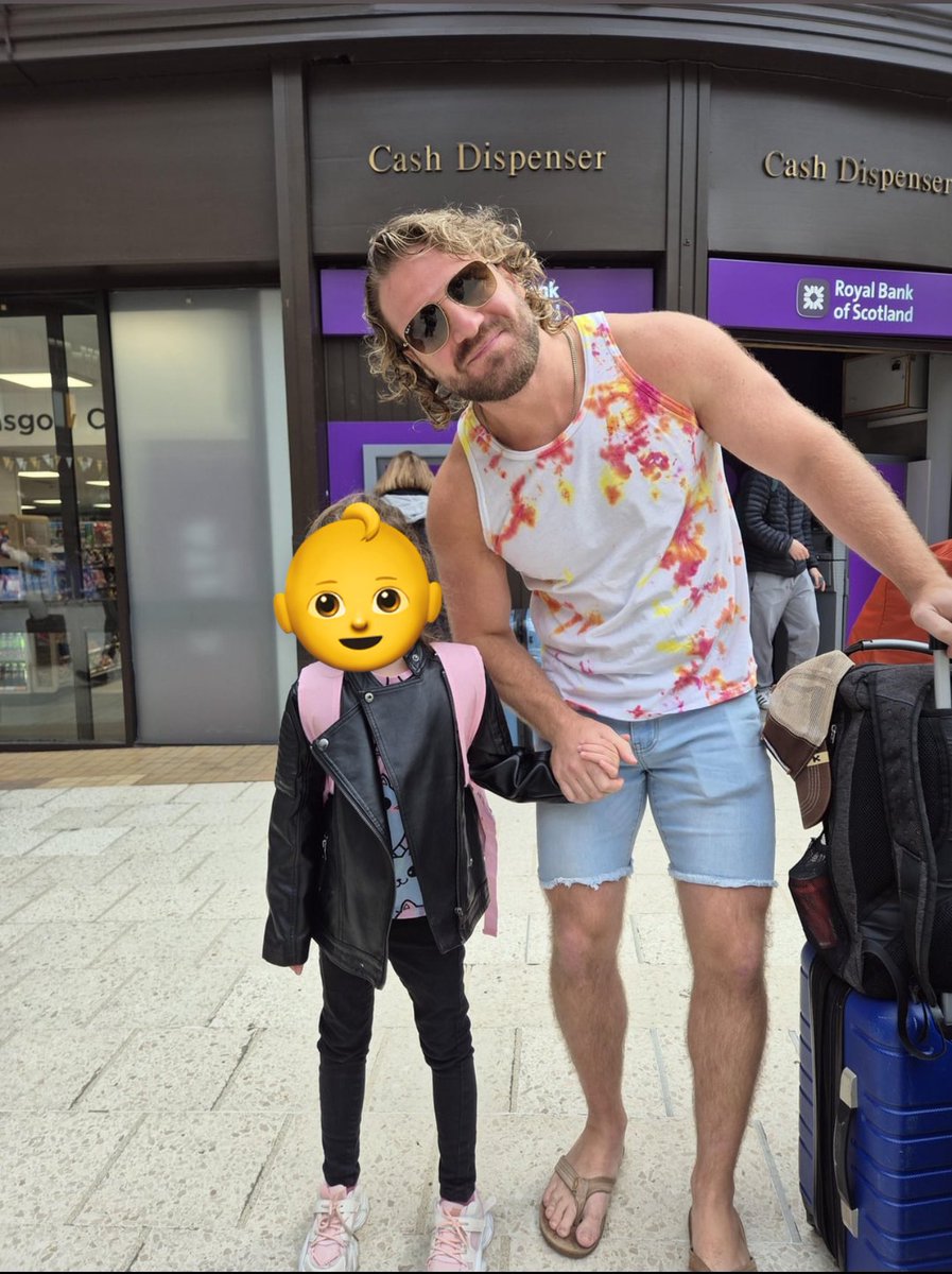 Hangman Page is walking the streets of Glasgow in a tie-dye tank, jorts, and thong flip flops while stoping and posing for pictures with little kids

My world champion.