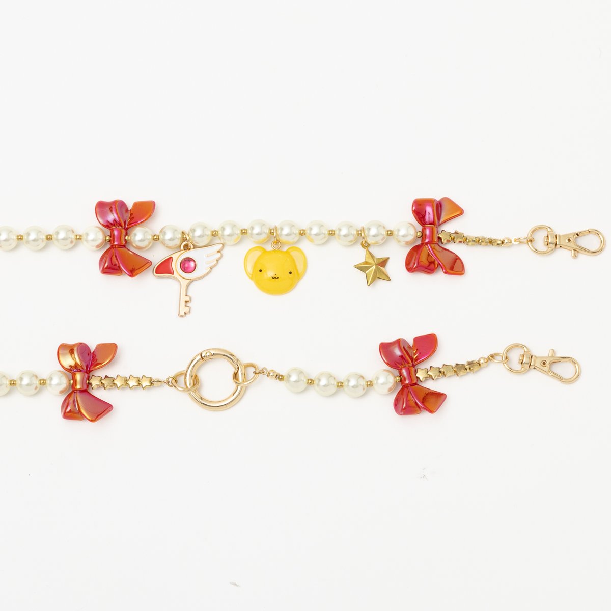 SuperGroupiesEN's tweet photo. [Pre-Order]
#CardcaptorSakura: #ClearCard - Key of the Seal Model Phone Strap &amp; Phone Tab

This glittering phone strap consists of cream-colored pearls &amp; red ribbons. #CCS

Shop now✨
https://t.co/LqPkIZ5rNT

Customers in the US &amp; Canada, please see QRT▼
https://t.co/OVb5JTp5Eb https://t.co/LlbSzGKF2n