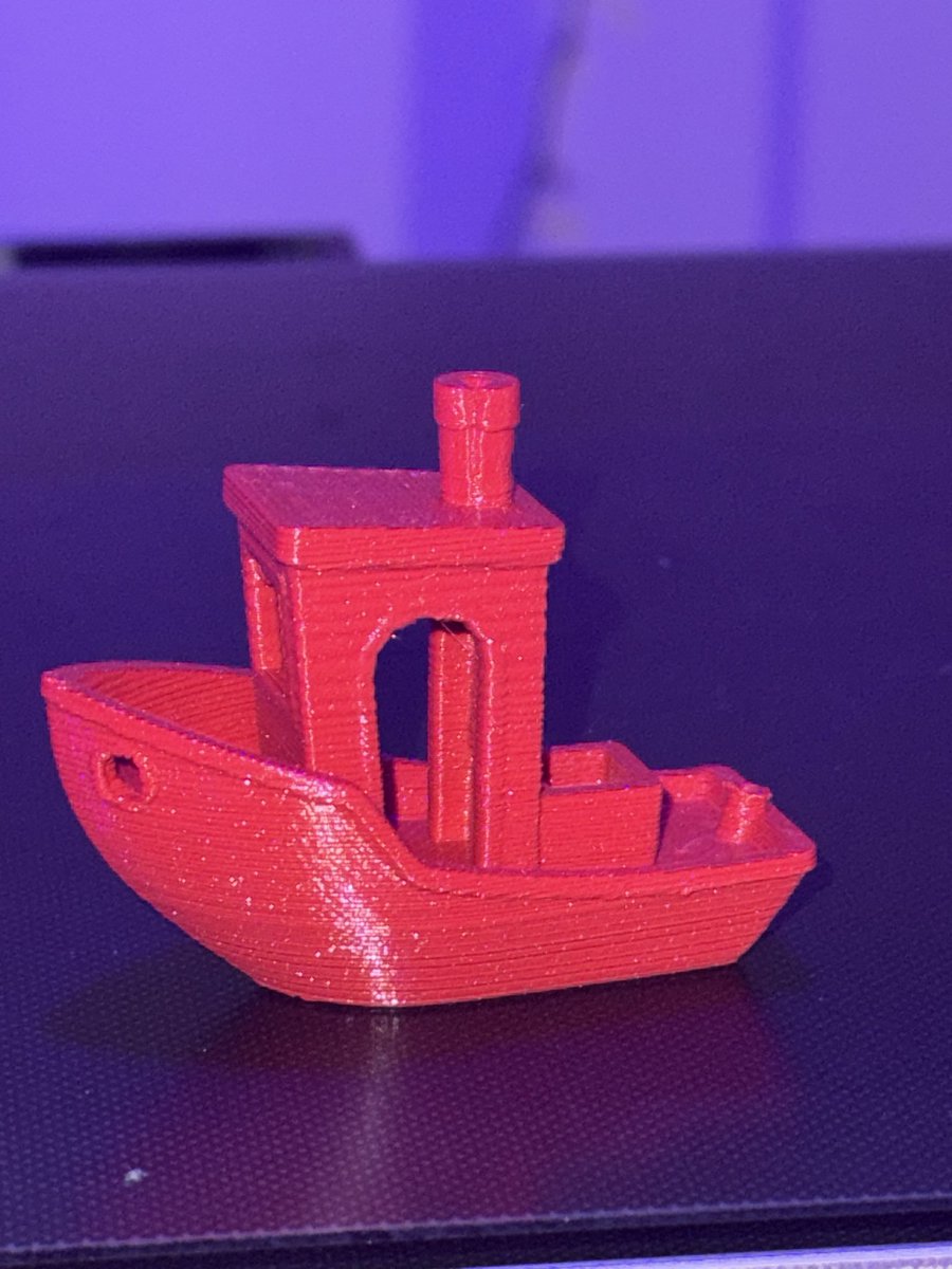 We FINALLY got a successful test print! It has some mild ringing but it’s not cooling related! We can work with that from here! The new fan duct design is a step in the right direction! Now I just need a sturdier table lol

<a href="/ZombieHedgehog_/">ZombieHedgehog | Hedgehog Makes</a> galaxy red makes for great benchies!
