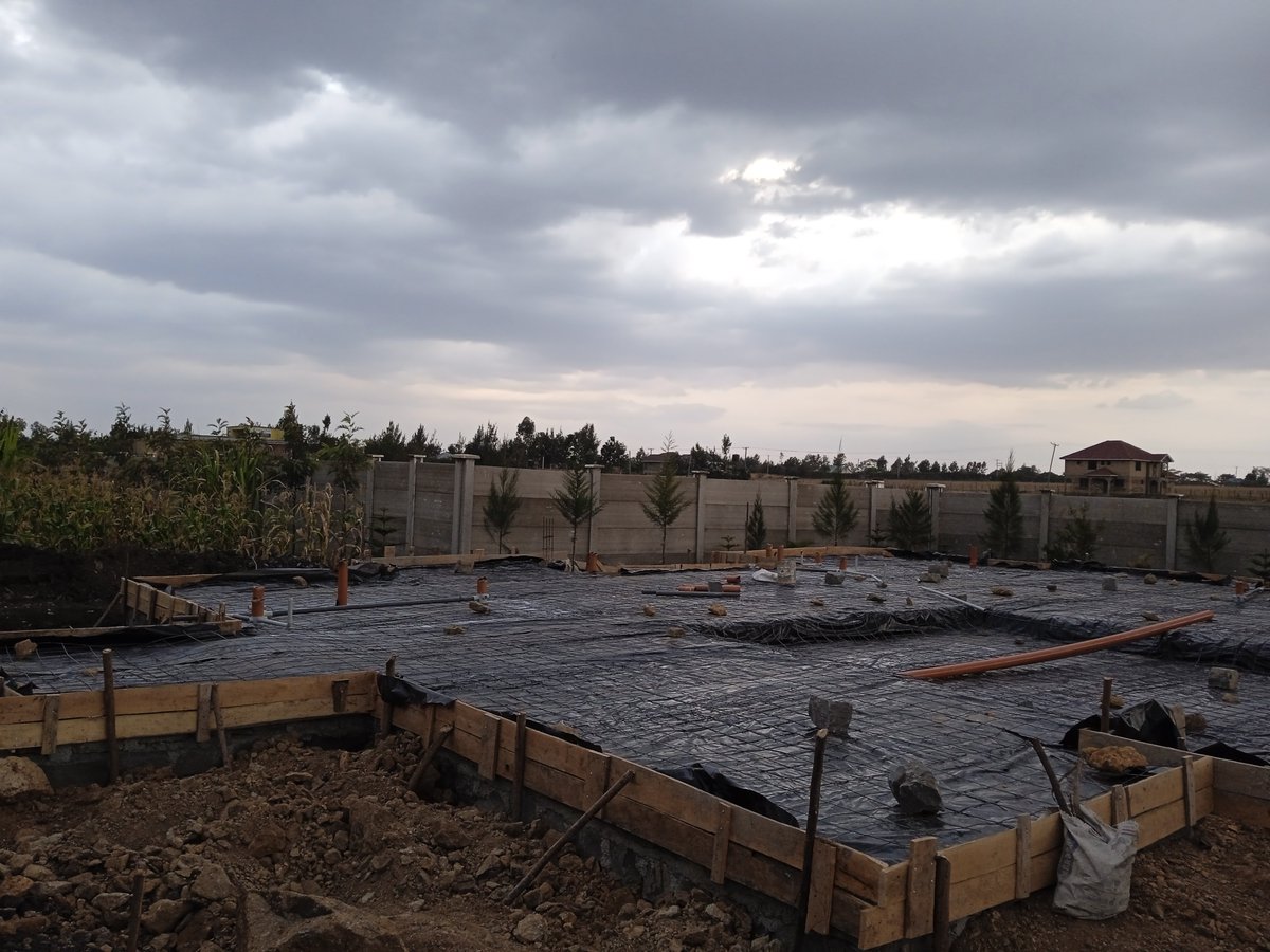 Sealing the deal against moisture before the slab takes shape! 🏠🔨