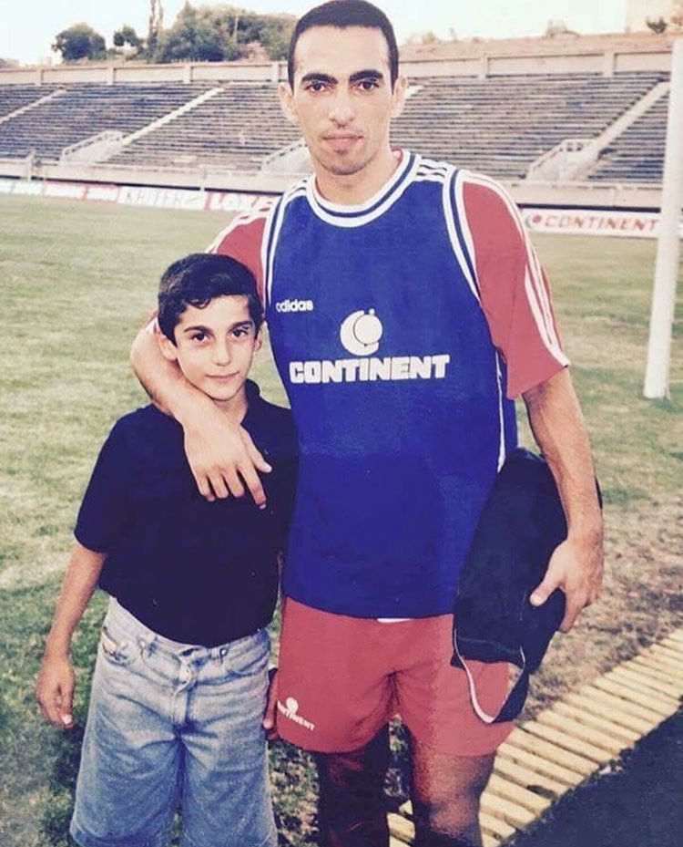 Youri Djorkaeff posing with a young Henrikh Mkhitaryan.