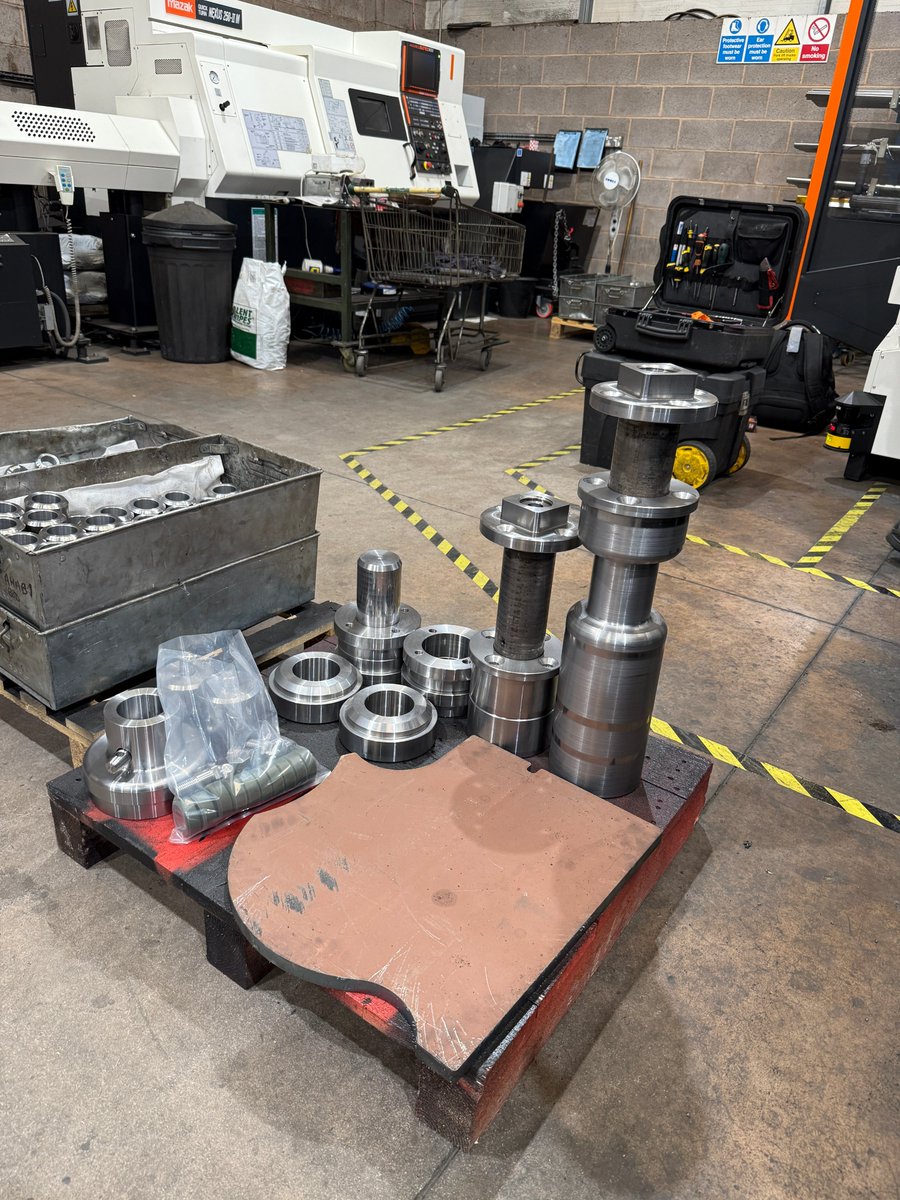 It's tree and hedge pruning time of year. On this pallet, CNC machined parts for another Tree Shear build. Pins and bosses are ready. The Hardox® 450 blade billet awaits the milling of the complex bevel profile.

When you buy direct you know you can rely on spares  backup.