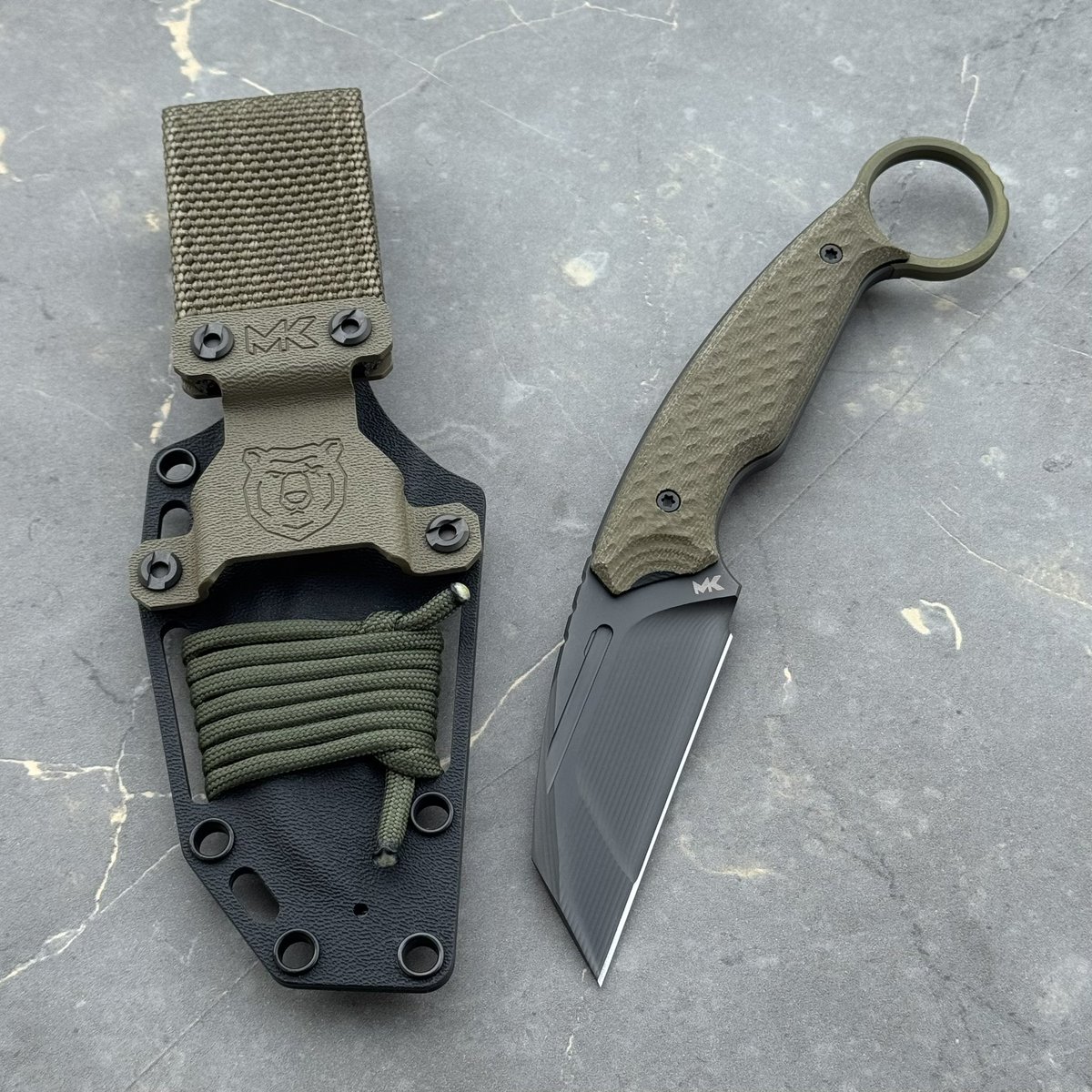kapuga_pl's tweet photo. @MK_Knives_Tools Claw “Fear The Bear” DLC Vanadis 23 &amp; Titanium Finger Ring Green Canvas Micarta &amp; Black G10 Black Kydex https://t.co/Nd2aXJ3Zfv https://t.co/hM3wn17RzC