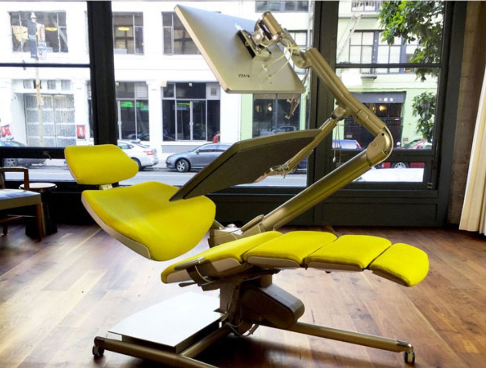 why don't more people work like this? distributes weight over the back. no lumbar issues.

(image grabbed over the net, too embarassed to share my setup - but its directionally similar and i realize i can work much longer in this setup than regular office ones)