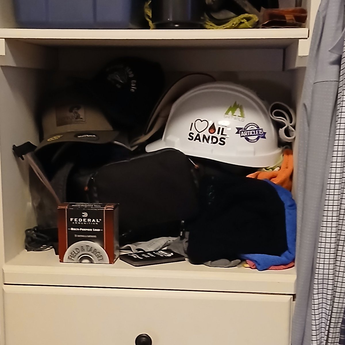 I have over 30 firearms properly locked and stored in lockers in my basement.

But I have one shotgun in my closet, and this box of shells.  It's just cheap target loads, but it still packs a punch.  Everyone in my family knows how to use all my forearms.

My house in sacred