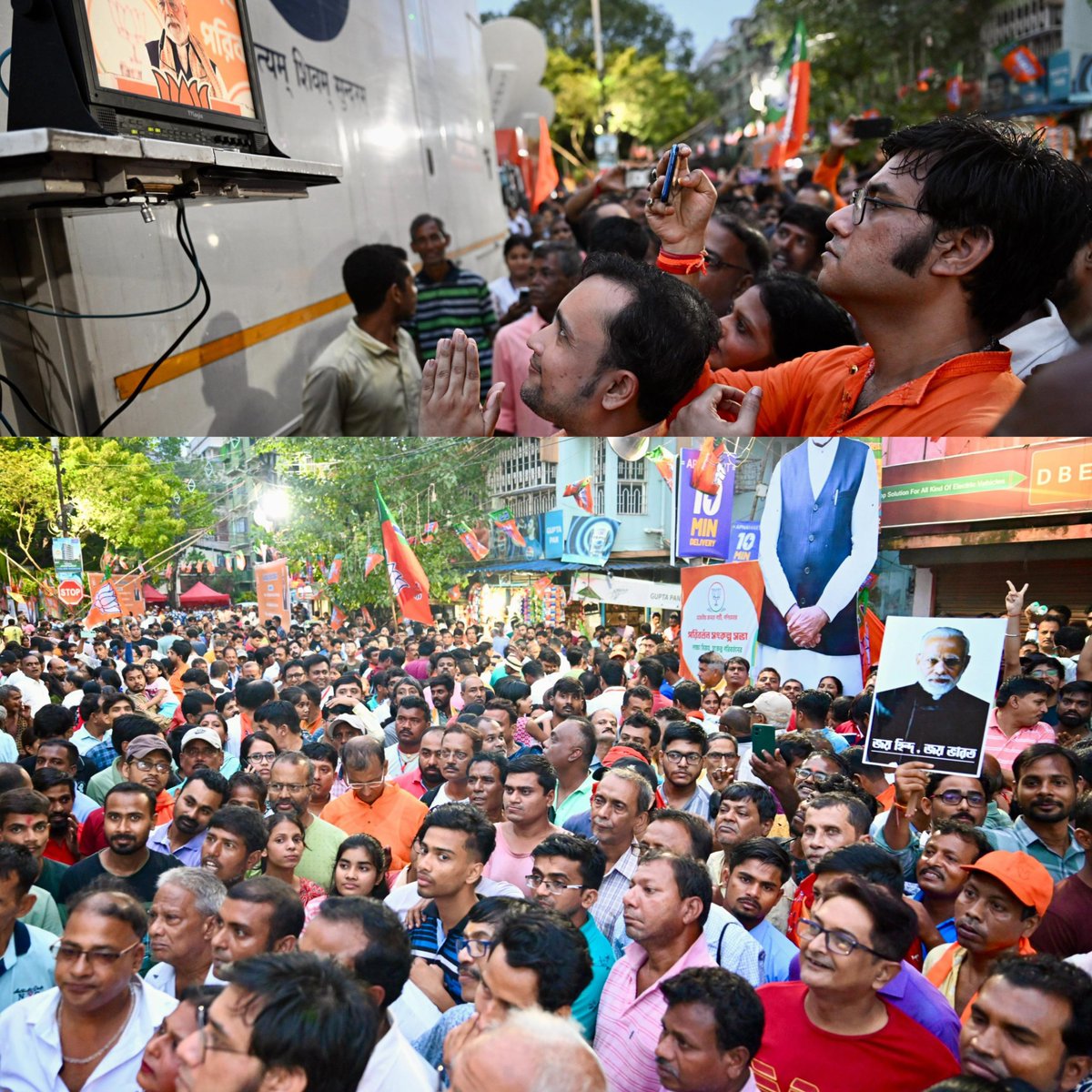 People are standing outside and watching PM's address near DD van because they couldn’t find space inside the rally venue at Kolkata