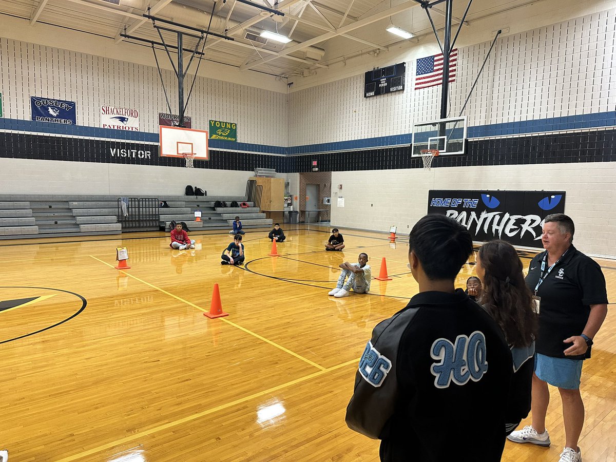 Seguin tennis with our new team captains  Emmy and Robert, talking to Ousley students about Seguin tennis