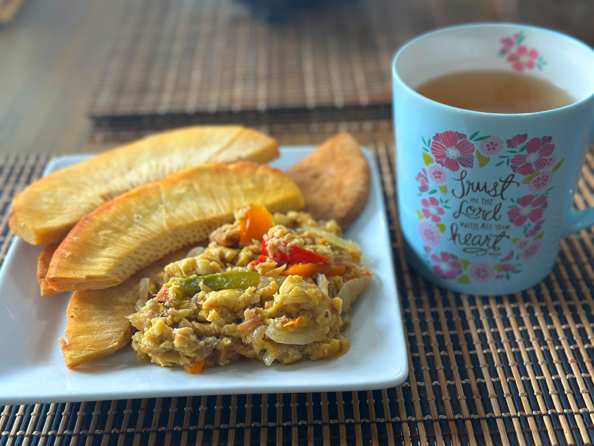 Ackee and saltfish with breadfruit, piece a bammy and likkle fever grass tea. *burp* Tank gad