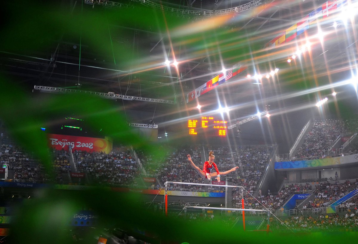 Used a star filter on my lens to get this photo of Nastia Liukin (USA) in action on the uneven bars 17 years ago today at the 2008 Summer Olympics in Beijing, China. <a href="/NastiaLiukin/">Nastia Liukin</a> 

📸 <a href="/rebilasphoto/">Mark J. Rebilas</a>